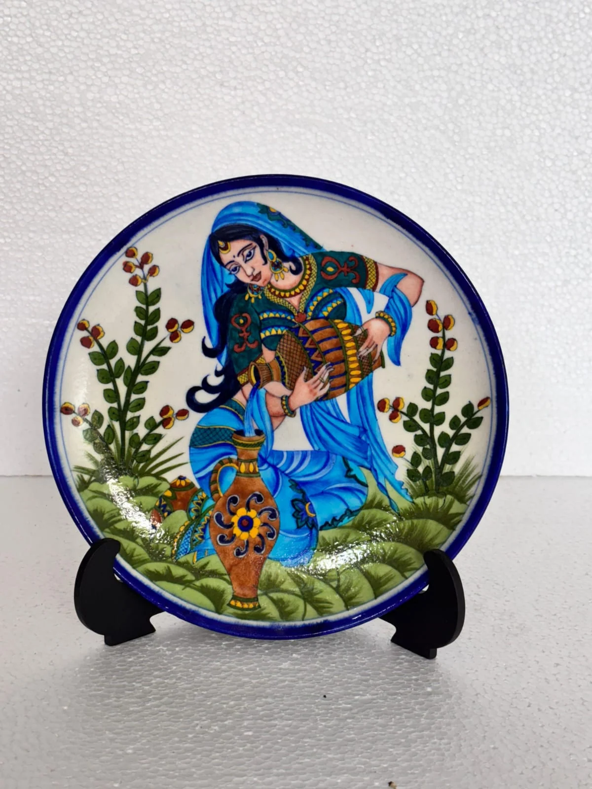 Indigo Flute Player Plate — handmade Jaipur blue pottery by Sagar Blue Art Pottery