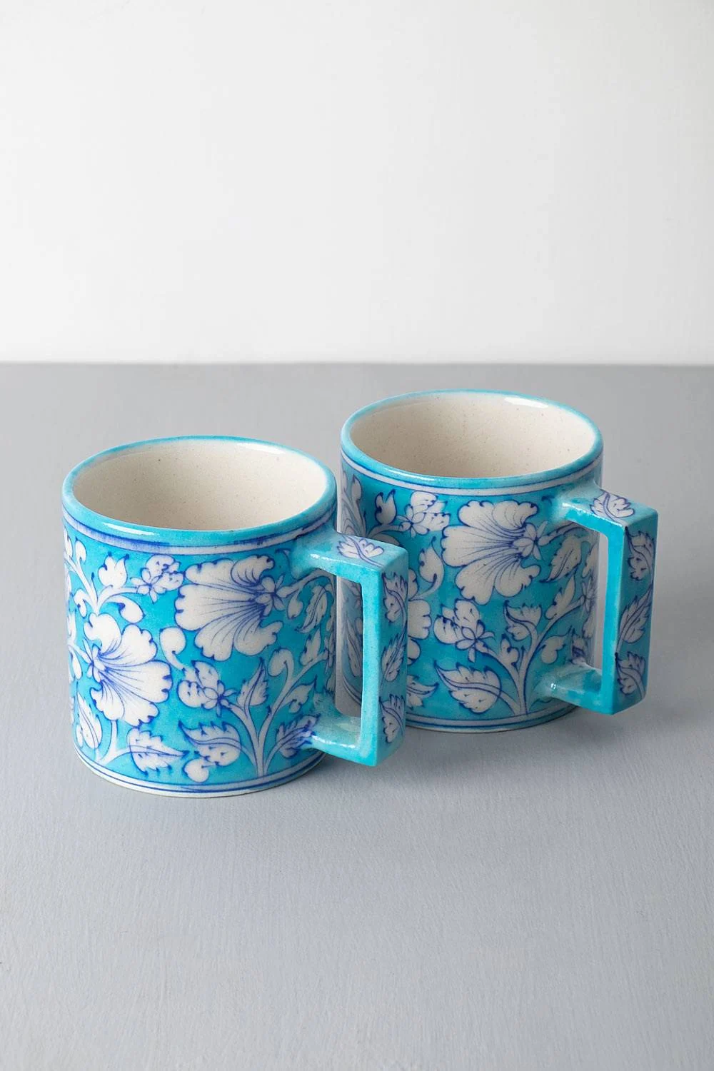Pair of Turquoise Jasmine Mugs — handmade Jaipur blue pottery by Sagar Blue Art Pottery
